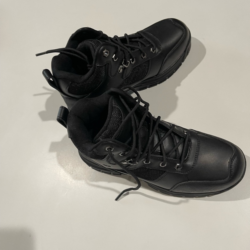 Men’s 8 or Ladies 6 industrial no-slip, reinforced toe, compliant work boot.